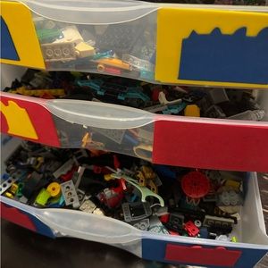 Over 2000 legos different boxes in a stacked shelf